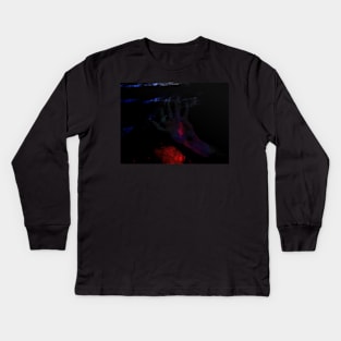 Digital collage, special processing. Hand laying on some wet surface. Psychedelic. Dark, dim. Light in center of palm. Kids Long Sleeve T-Shirt